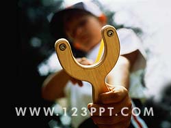 Boy with a Catapult Photo Image