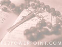 Rosary on Bible powerpoint background
